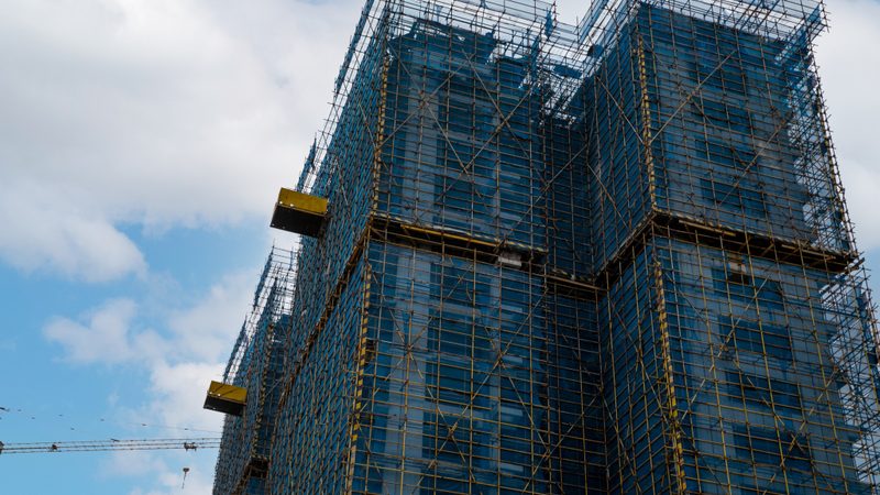 高层建筑幕墙选型：单元式与框架式到底谁更靠谱